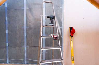 Attic renovation. Installation of drywall
