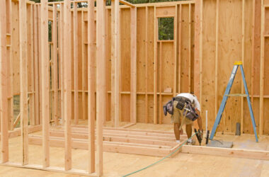 Framing building contractor framing up a wall section for a luxury custom house